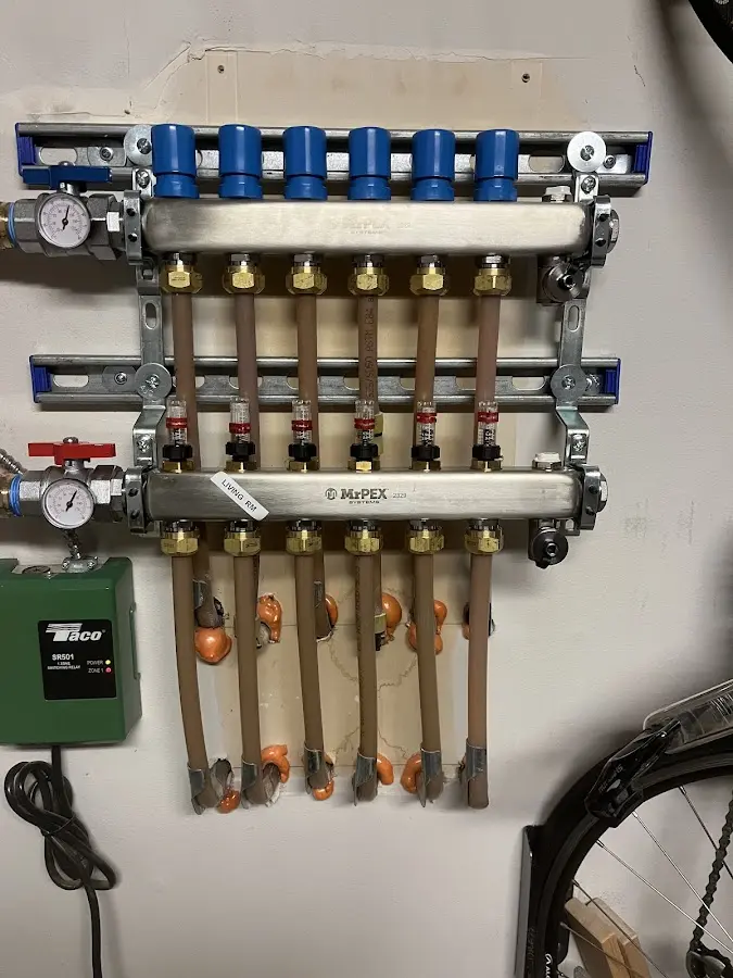 Plumber performing Water Heater Repair at a residential property in Niagara